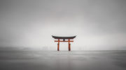Foggy shot of the floating torii of Miyajima, Japan during rain